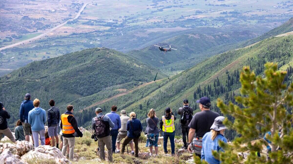 Spectators watched as helicopter crews worked on installing lift towers during the first Future in Flight event in July.