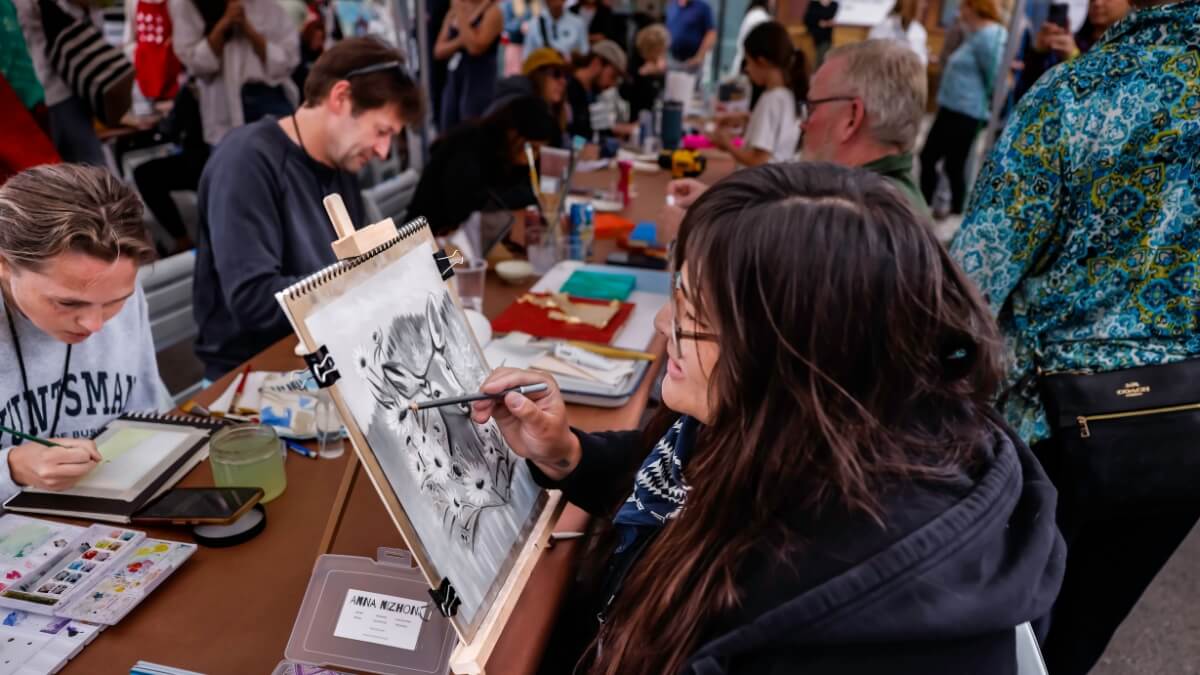 Artist Anna Nizhoni at Monster Drawing Rally for Arts Council of Park City & Summit County.