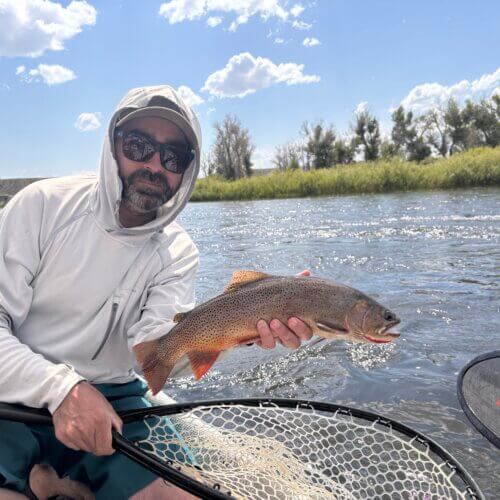 Angler Brian Modena with a Colorado cutthroat caught in the Green River. Photo: Brian Modena