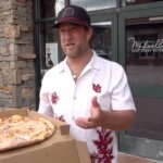 Dave Portnoy, founder of Barstool Sports, reviews a slice from Maxwell’s East Coast Eatery in Park City, giving it a 7.1 in his popular “One Bite Pizza Review” series.
