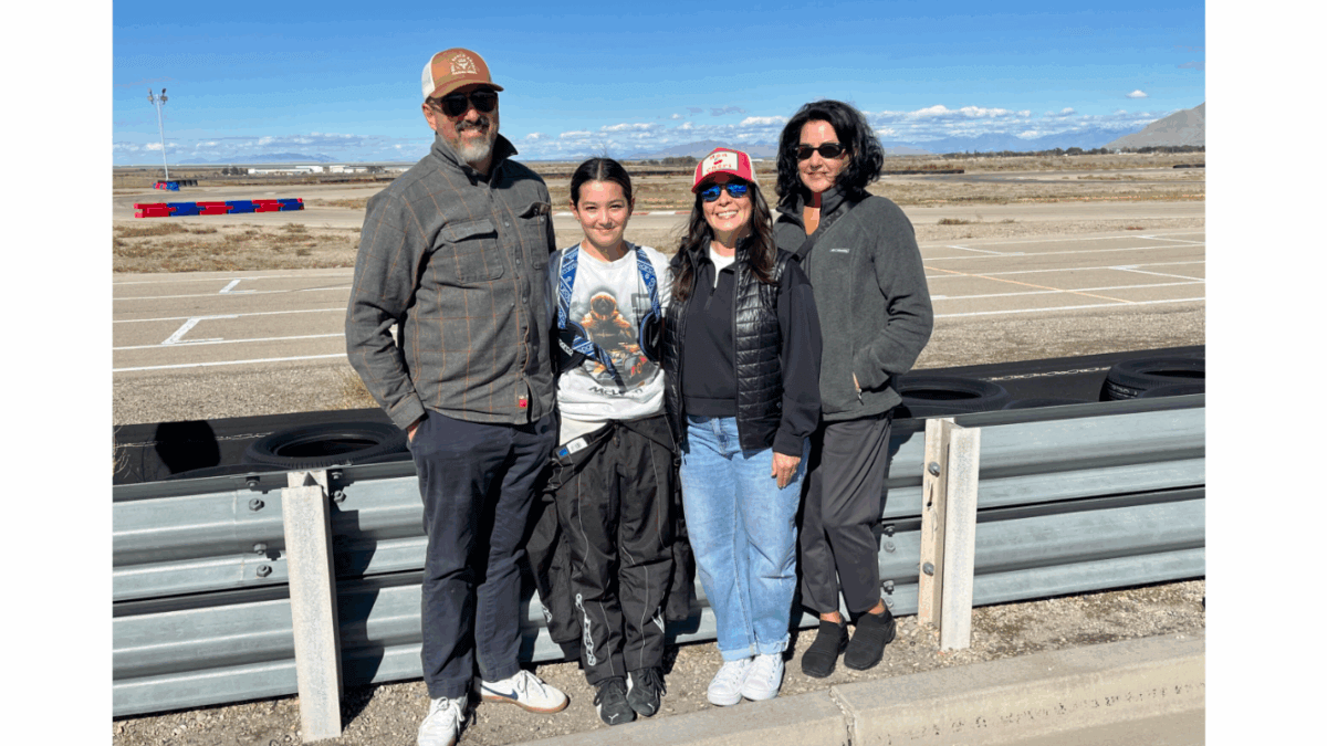 Dad Rob, London, Mom Allison and 'Grammy' Carla Zarkos at a kart race in Utah over the weekend.