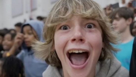 A student known online as the “Mason 6-7 Kid” reacts during a viral basketball-game video that helped popularize the phrase “6-7,” recently named Dictionary.com’s 2025 Word of the Year.