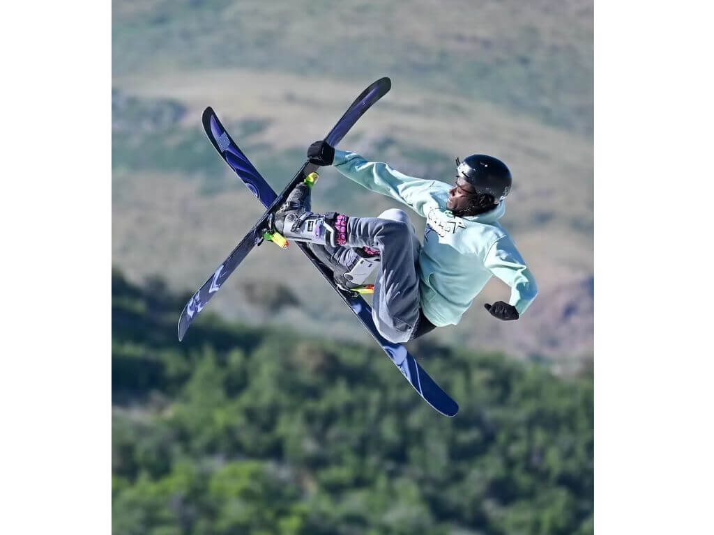 Seventeen-year-old free skier Bogale “Bo” Giddings catches air during a training session in Park City. The Ethiopia-born athlete now competes internationally and aims to represent his birth country in the 2030 Winter Olympics.