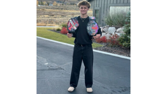 Park City’s Sam McKenzie, 15, holds his championship belts after winning the 2025 USA BMX Next Freestyle Amateur National Championship in San Diego on Oct. 11. McKenzie, who also won last year’s title in the 11–14 age group, now holds the 15–30 Amateur National title and plans to advance to the Expert class next season.