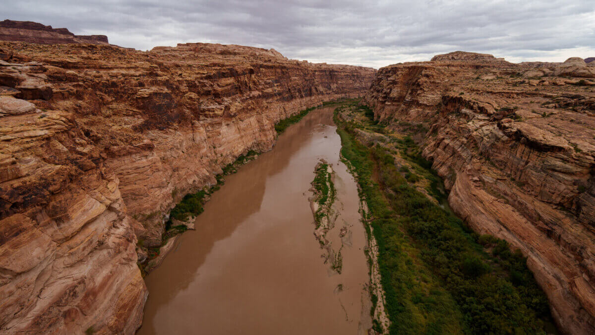 The Colorado River is pictured where it flows near Hite, just beyond the upper reaches of Lake Powell, on Friday, Sept. 19, 2025.