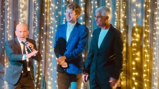 Olympic USA speedskating medalists (L-R) Derek Parra, Casey Dawson, and Eric Heiden together on stage in Park City representing local nonprofit Youth Sports Alliance last month, just weeks before the upcoming World Cup.