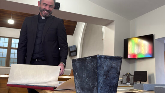 Rev. Andrew Fleishman looks at a century-old time capsule at the Japanese Church of Christ in Salt Lake City, Monday, Nov. 3, 2025.