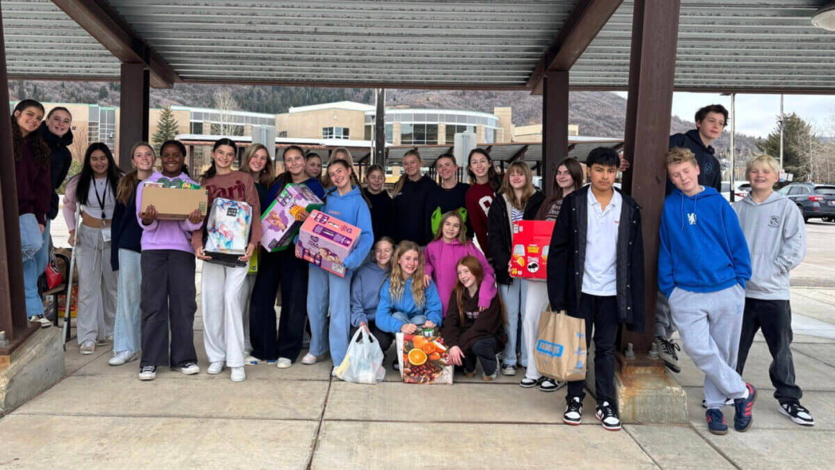 Ecker Hill Middle School Leadership students gather before delivering nearly 500 pounds of donated food to the Christian Center of Park City, wrapping up their community-driven holiday food drive.