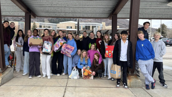 Ecker Hill Middle School Leadership students gather before delivering nearly 500 pounds of donated food to the Christian Center of Park City, wrapping up their community-driven holiday food drive.