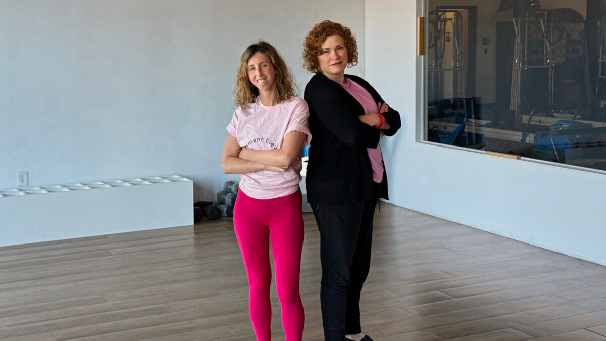 Rachel Lando and Kristy Smith, co-owners of Movement Elevated, stand inside their new studio in lower Pinebrook ahead of its Nov. 15 grand opening. The space will offer Pilates, yoga, and rolling classes designed to be accessible for all bodies and abilities.
