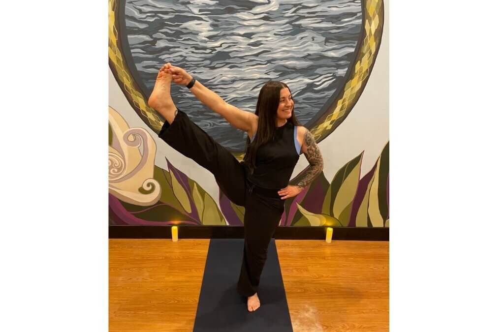 Jennalynn Vignogna practices outside PC Yoga Collective, bringing her signature blend of strength, ease and grounded presence to the Park City community.