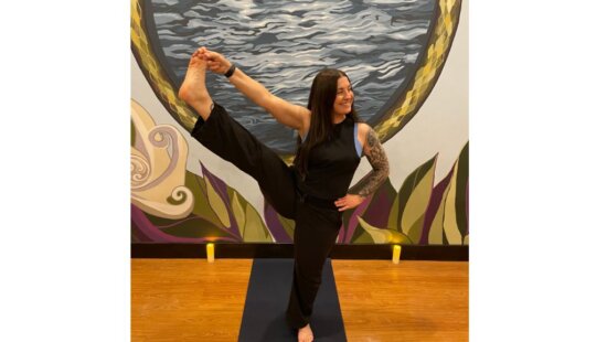 Jennalynn Vignogna practices outside PC Yoga Collective, bringing her signature blend of strength, ease and grounded presence to the Park City community.