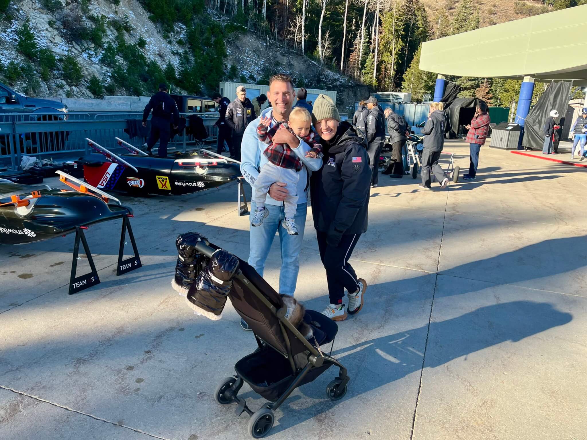 USA Bobsledder Olympian Kailiie Armbruster Humphries and her husband, and their child at the Utah Olympic Park.
