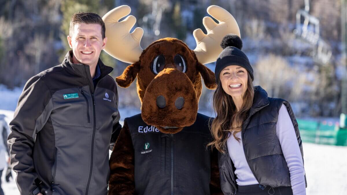 Dan Gregory, Deer Valley Resort’s director of organizational design and expansion, poses with Eddie, the resort’s new moose mascot, and illustrator Ashley Moore during a book-signing event for Deer Valley’s new adventure story and coloring book in Park City, Utah.