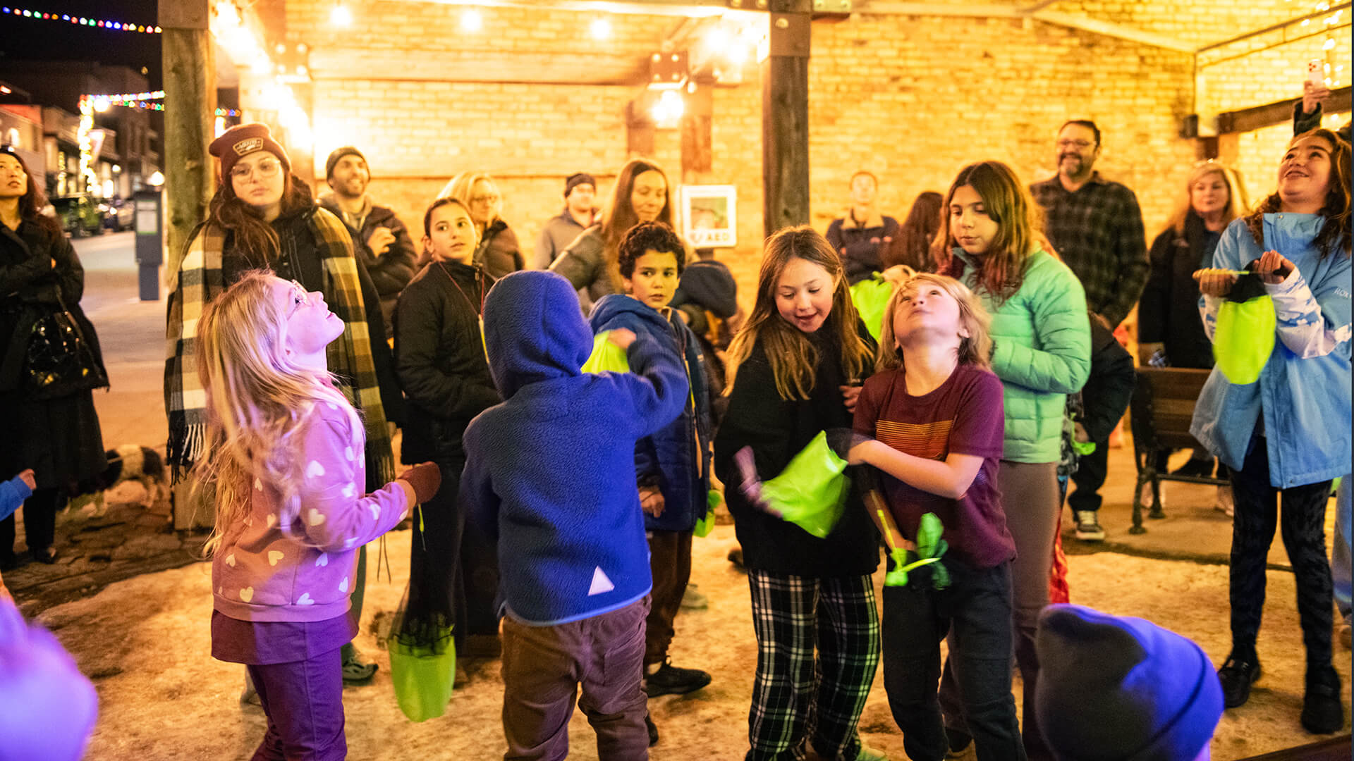 Giant Menorah Lighting in Miner's Park, sponsored by Historic Main Street and Chabad Lubavitch of Park City. Toys and gelt thrown off the ladder of the PC Fire Department
