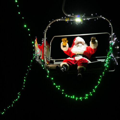 Santa Claus rides down the Town Lift, Park City Mountain Resort
