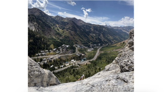 Emmett Olson rock climbing above the Snowbird Ski Resort in Utah's Little Cottonwood Canyon in the autumn of 2025.