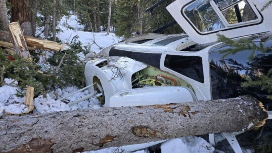 A helicopter crashed in a snowy, wooded area near Wolf Creek Campground after a Sunday afternoon that critically injured one of four occupants.
