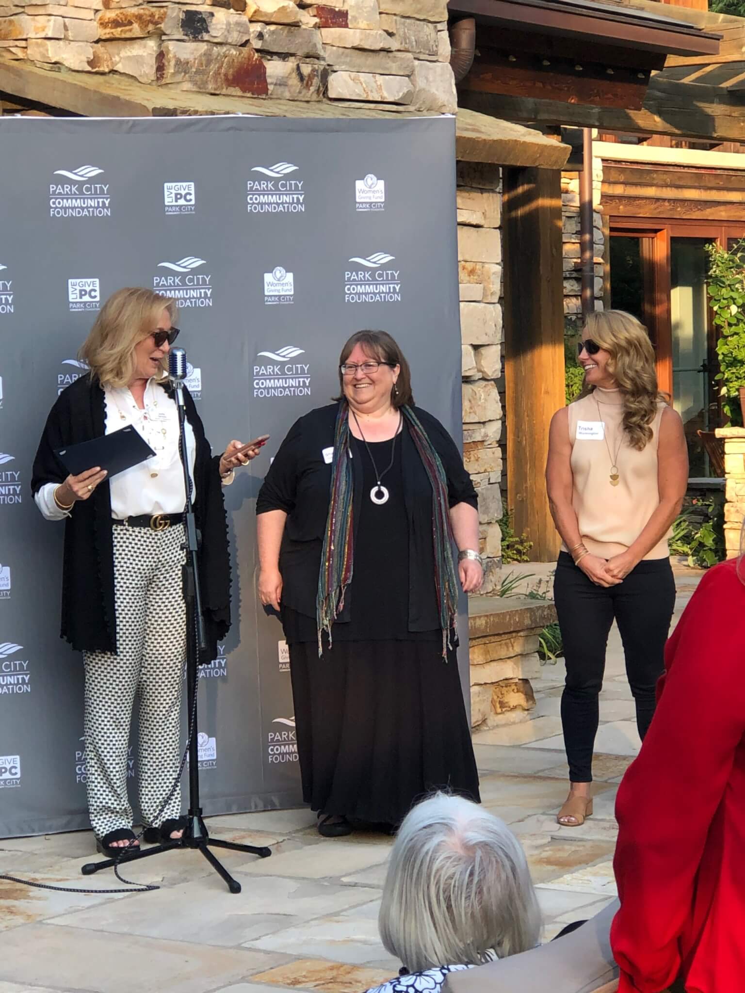 Shelley Gillwald (center) receiving the Trisha J. Worthington (right) Community Service Award for her work at PCSC serving Park City’s Latino Community.
