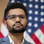 Rep. Maxwell Frost of Florida listens during a panel discussion in Washington, Jan. 10, 2023.