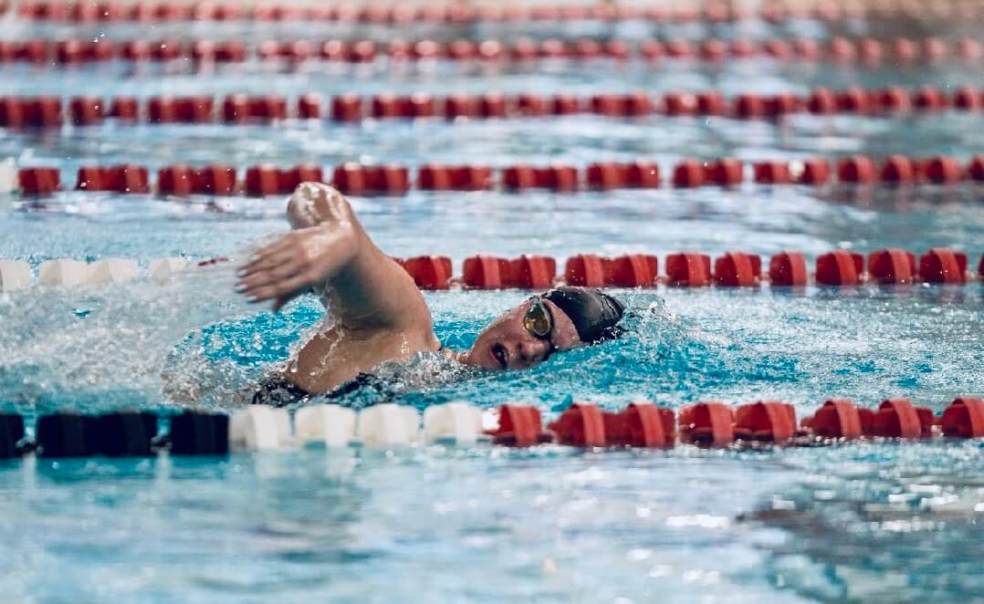 Anna Klug competing in home meet on Wednesday.