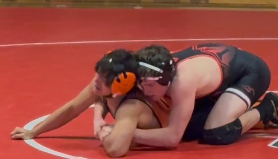 Park City High School senior, Jackson Richey, wrestling in a tournament at 150 lbs.