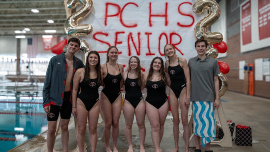 Park City High School swim team seniors, from left, Dmitriy Siminovskiy, Taylor Bergman, Anna Klug, Ruby Neath, Kathryn Schofield, Aisling Taylor and Kyler Collier pose during senior night on Jan. 22. The Miners defeated Judge Memorial as both teams prepare for the Region X Championships on Jan. 31.
