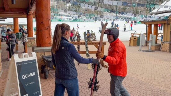 A skier returns a pair of premium skis slope-side through Quiver at Deer Valley Resort. The new Ski Butlers program, lets guests reserve specific skis online and have them ready for pickup just steps from the lifts.