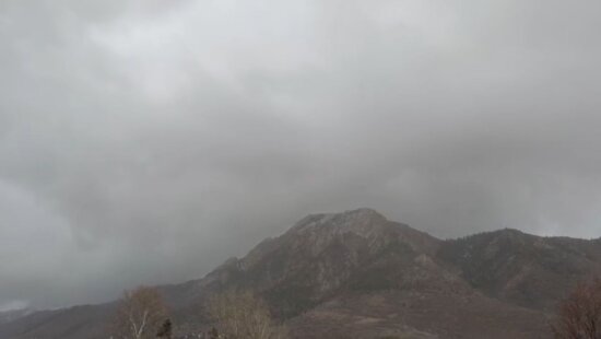 A winter storm rolls in over Mt. Olympus.