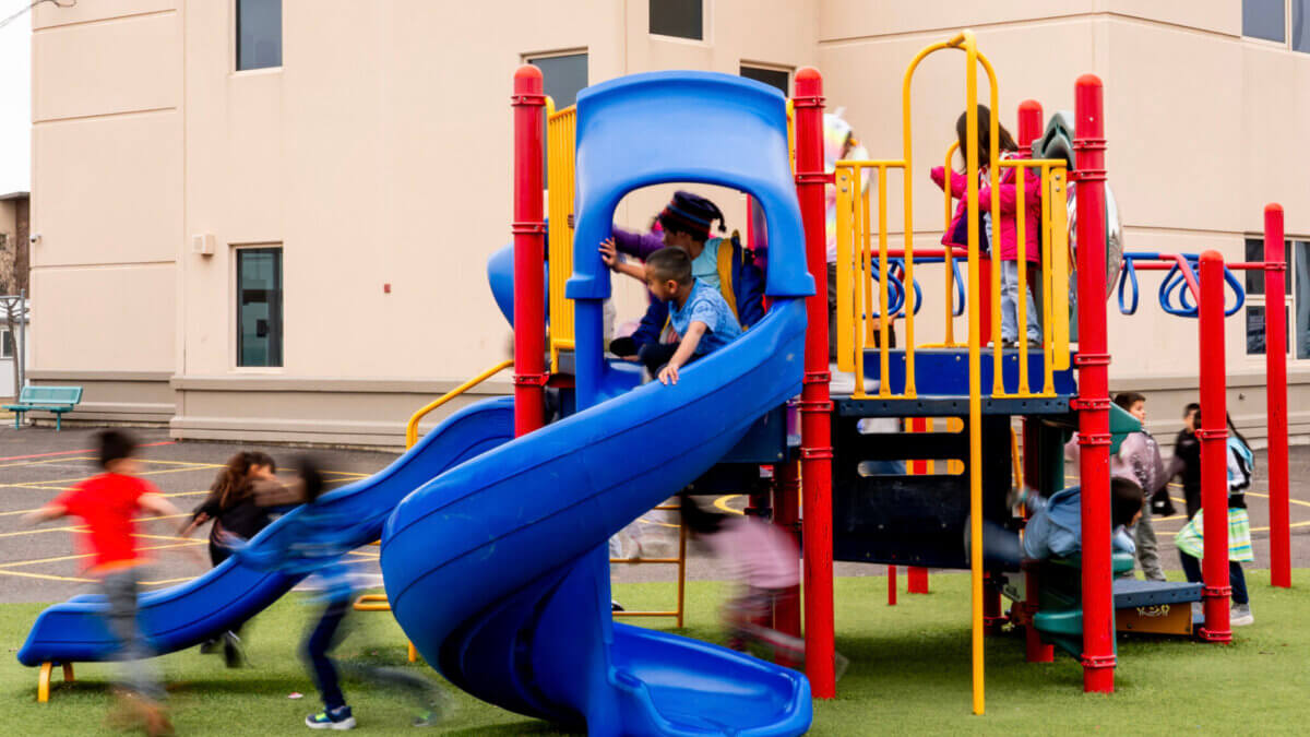 Students play on the playground at Woodrow Wilson Elementary School in South Salt Lake on Tuesday, March 12, 2024.
