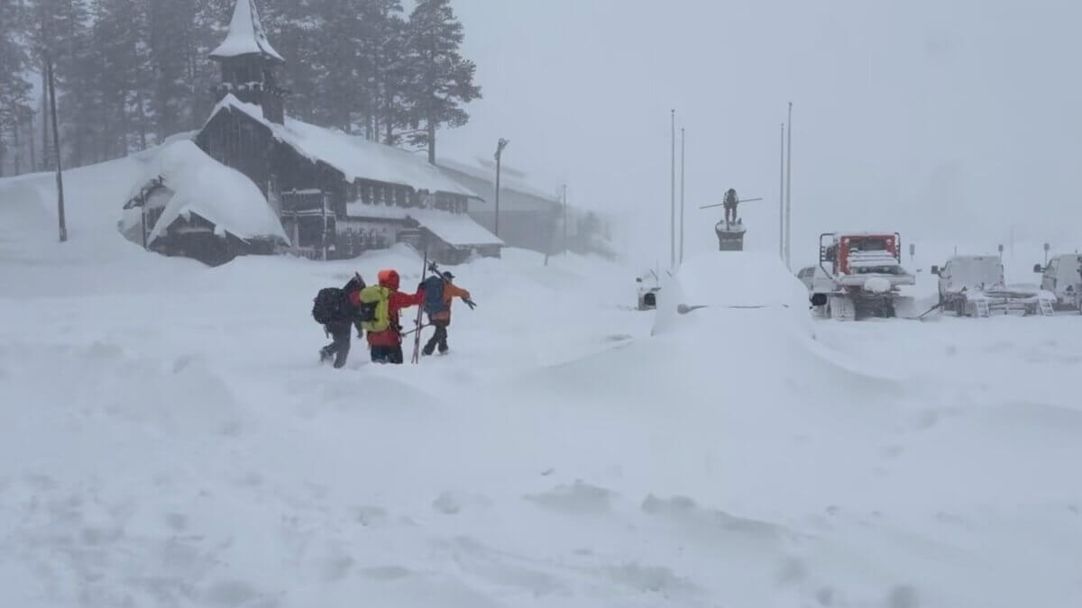 Search and rescue crews head into whiteout conditions near Castle Peak in Truckee, Calif., on Tuesday, Feb. 17