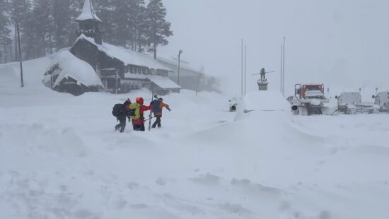 Search and rescue crews head into whiteout conditions near Castle Peak in Truckee, Calif., on Tuesday, Feb. 17