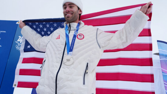 Silver medalist United States' Alex Hall holds an American flag after the men's freestyle skiing slopestyle finals at the 2026 Winter Olympics, in Livigno, Italy, Tuesday, Feb. 10, 2026.
