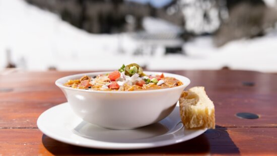 Deer Valley's new passholder perk: turkey chili priced by the daily run count at East Village Restaurant.