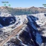 Peak 5 lift at Canyons Village with the Park City ridgeline behind it.