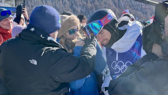 USA's Dylan Walczyc with a proud American crowd after his 7th place Dual Moguls result in the Milan Cortina Olympics.
