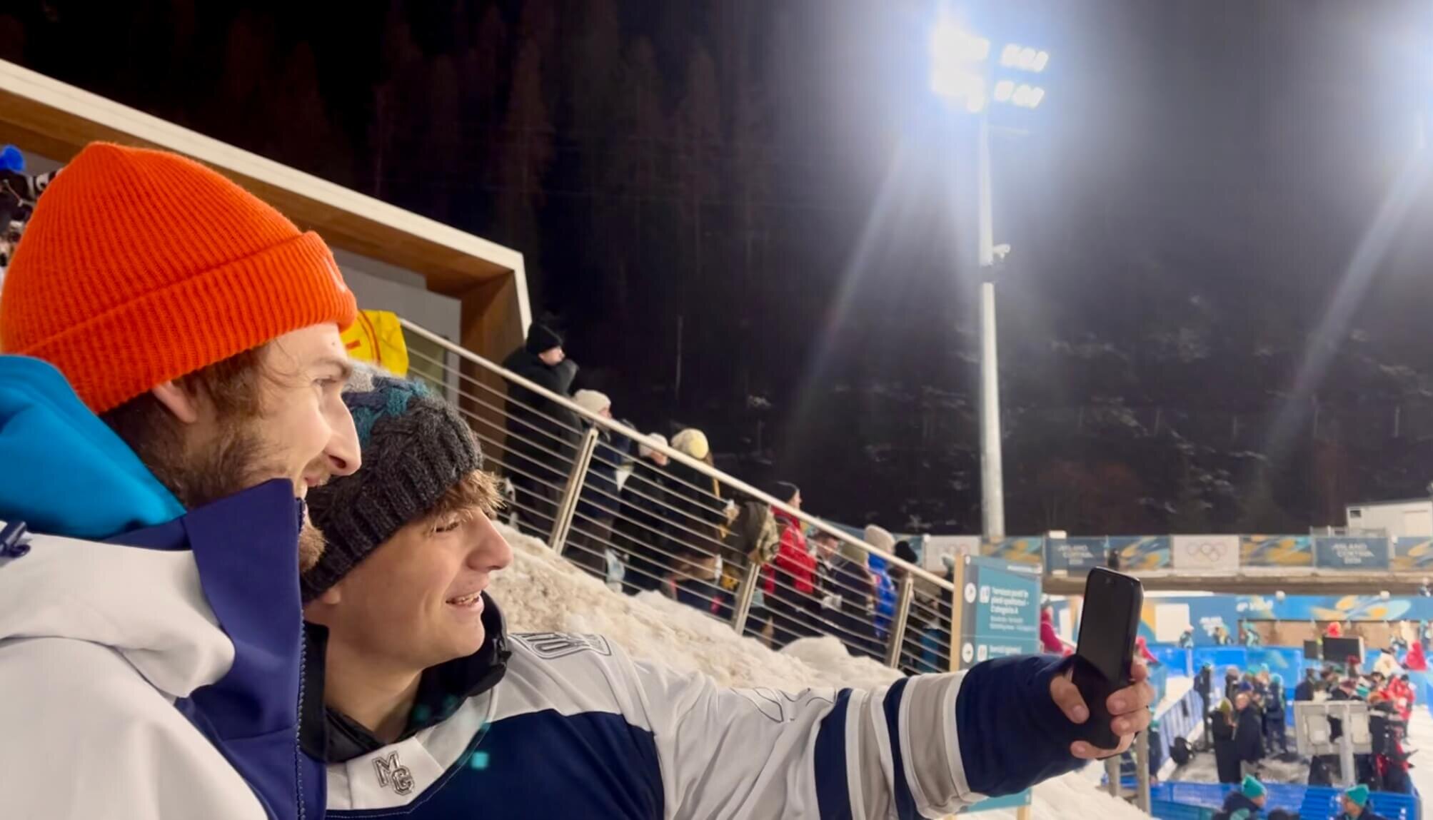 A fan, stoked to take a selfie with Kevin Bickner at the Milan Cortina Olympics.