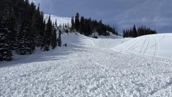 Fresh avalanche debris fills the runout zone beneath a steep slope in the Salt Lake area mountains as the Utah Avalanche Center warns of high avalanche danger Wednesday. Forecasters said recent heavy rain, snow and wind have created conditions where large natural and human-triggered avalanches are likely, and urged people to avoid slopes steeper than 30 degrees and areas below them.