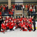 Park City High School Miners Varsity Red Boys Team holding the trophy minutes after winning 7-1 at the Utah High School State Championships in Salt Lake City on Wednesday.