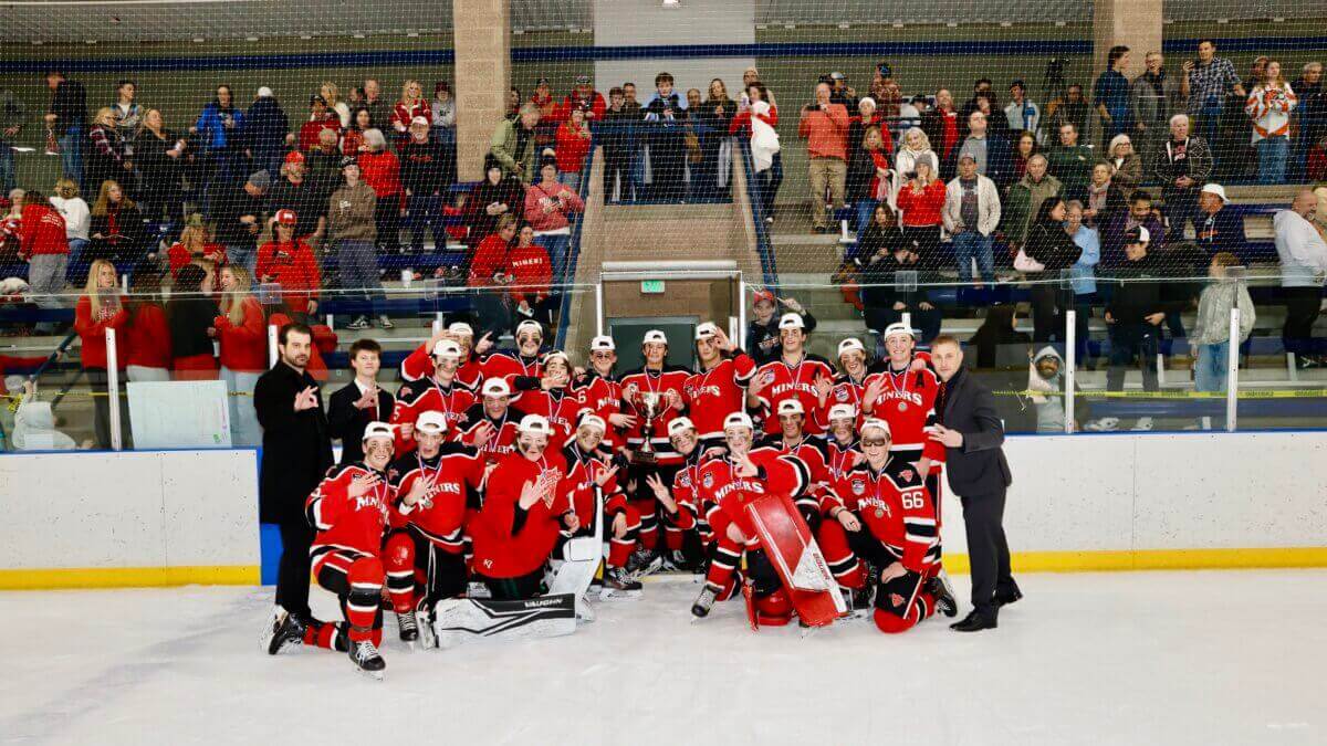 Park City High School Miners Varsity Red Boys Team holding the trophy minutes after winning 7-1 at the Utah High School State Championships in Salt Lake City on Wednesday.