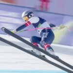 In this image taken from video provided by Olympic Broadcasting Services, OBS, United States Lindsey Vonn crashes during an Alpine ski women’s downhill race at the 2026 Winter Olympics in Cortina, Italy, Sunday, February 8, 2026.