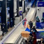 Ashley Farquharson after Run 1 of her bronze medal Luge event at the Milan Cortina Olympics.