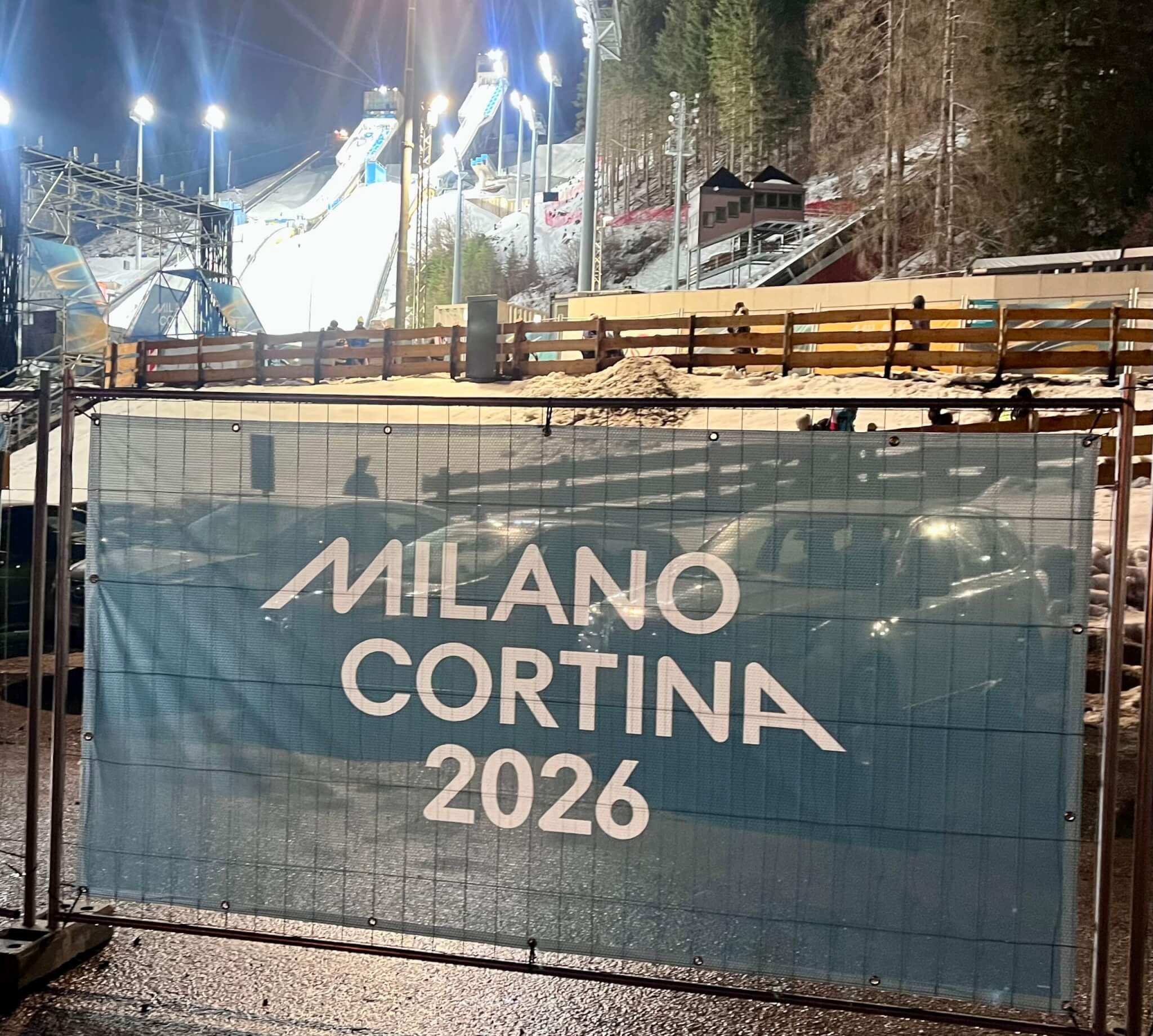 Olympic ski jumps in the background.