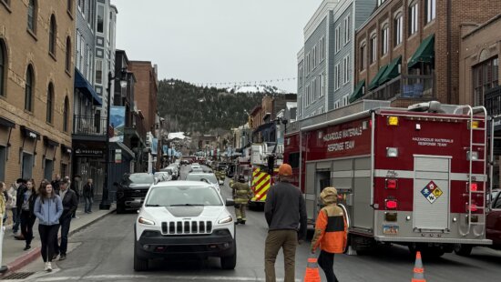 Park City Fire District units and road cones block access to Main Street Saturday as police evacuate the area following a bomb threat at the Egyptian Theatre.