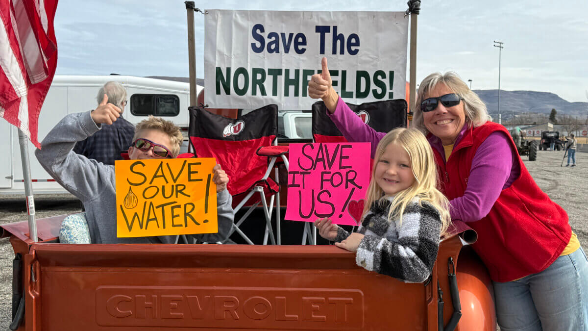 Families with children joined the Tractorcade, carrying signs reading "Save Our Water" and "Save It For Us." Photo: Hilary Reiter Azzaretti