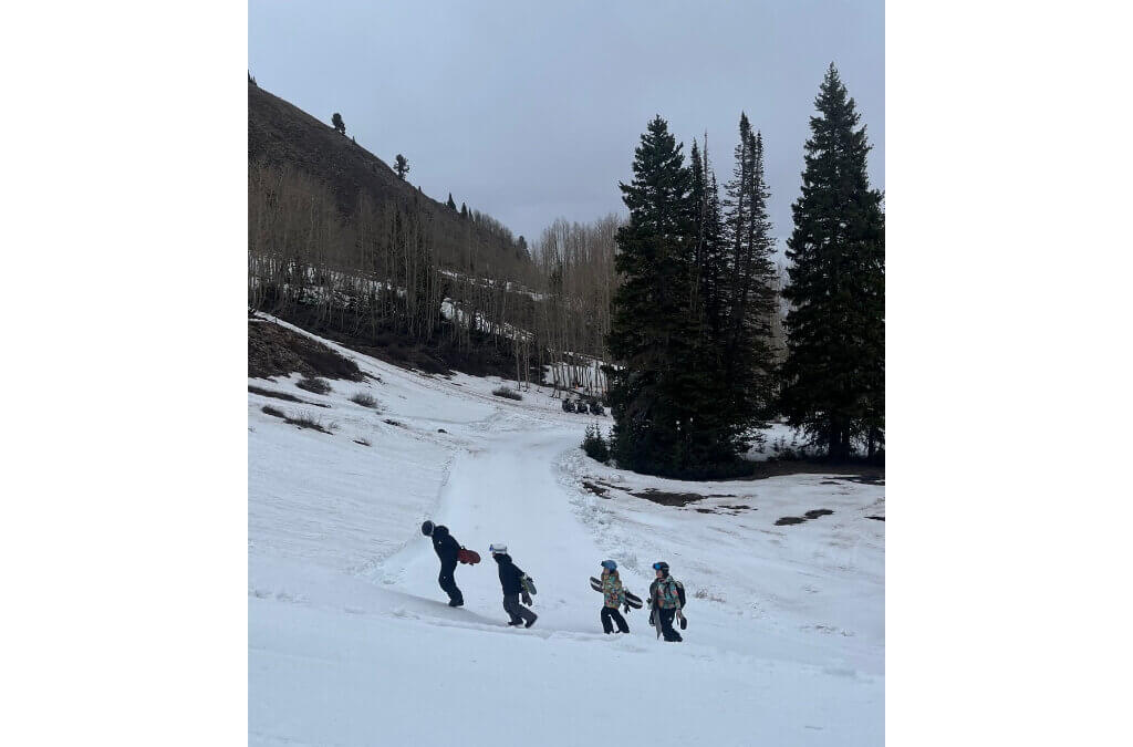 Lace poses with Park City PUPU products at a local retail display. The boutique organic candy line, which she co-founded at age 15, is inspired by the moose that wintered in her family's backyard for nearly two decades.