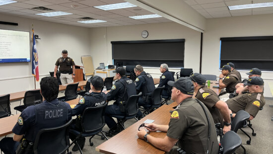 Officers attend training for the upcoming distracted driver crackdown by the Utah Department of Public Safety.