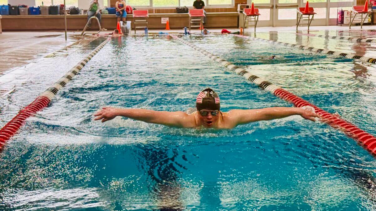 C.J. Haerter training in his home town of Park City to swim at national event for Special Olympics USA.