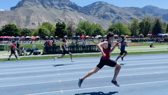 With "Y" Mountain in the background, PCHS competes in the Utah State Championships for Track & Field at BYU.