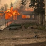 The Cottonwood Fire, which sparked Monday, has spread into Eagle Point Resort, destroying several cabins and structures.